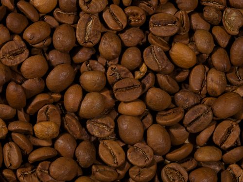 Close-Up of Roasted Coffee Beans Macro Shot · Free Stock Photo