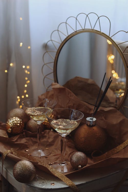 Glasses with Champagne in New Year Decoration