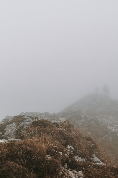 Mountain Peak Covered in Thick Fog