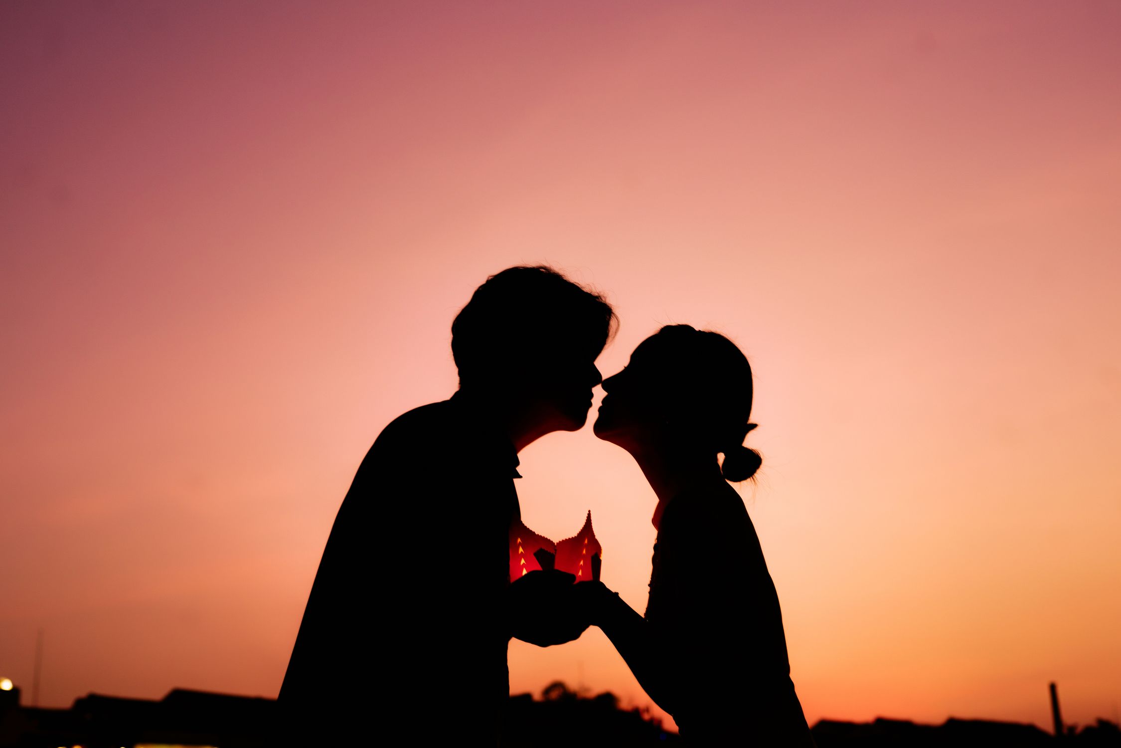 Silhouette of Couple Kissing · Free Stock Photo