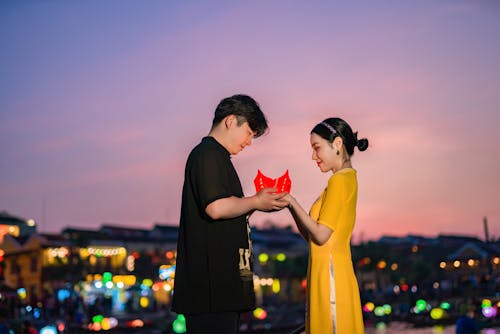 Couple Holding Red Paper Lantern
