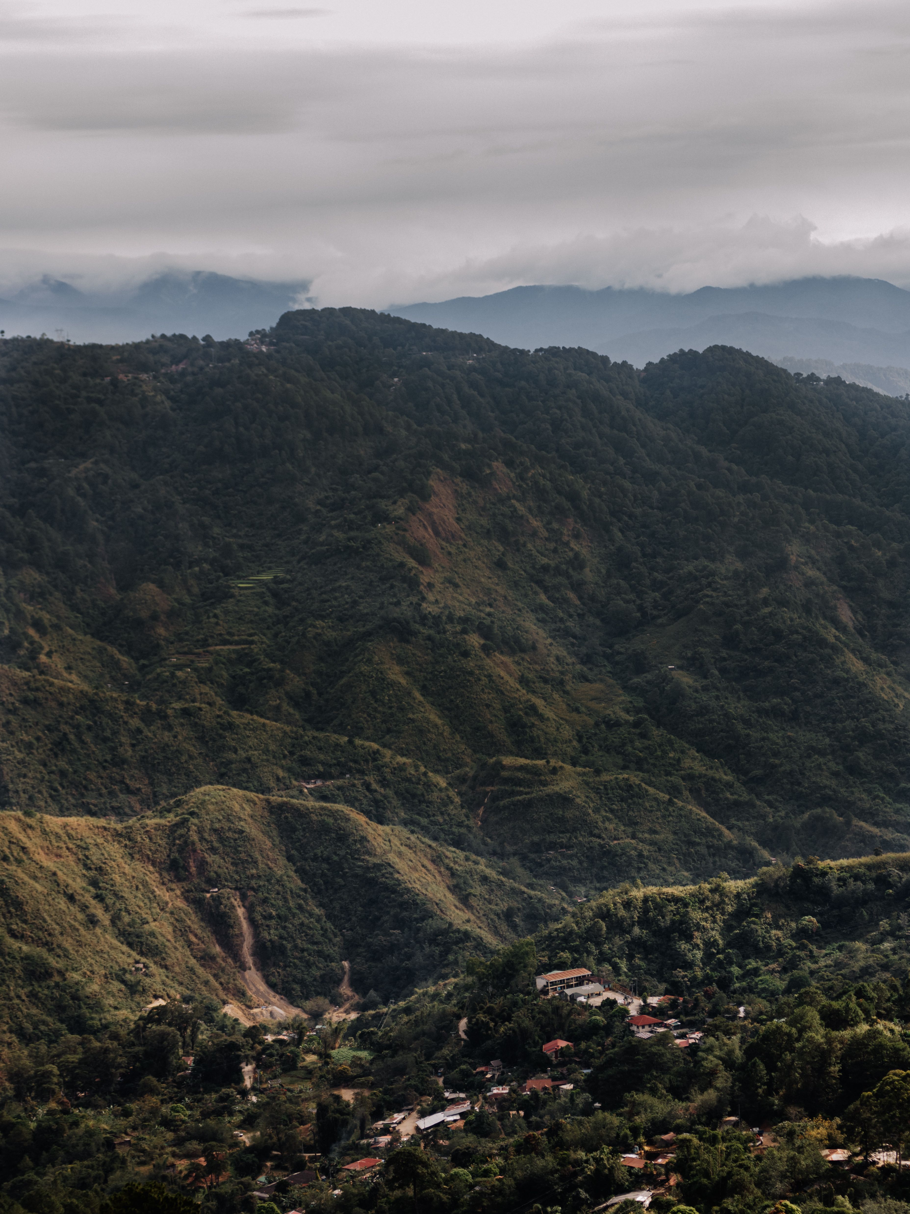 Aerial View of Village in Mountain Valley · Free Stock Photo