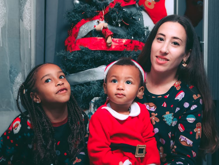 A Family Wearing Christmas Sweaters