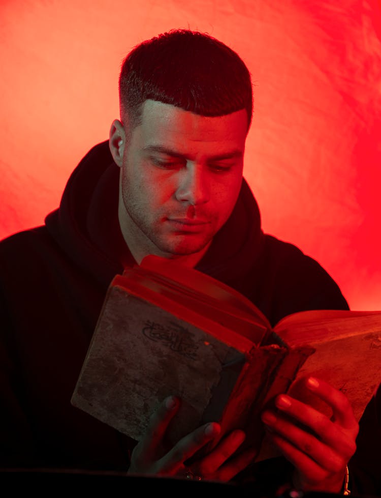 Man Reading Old Book