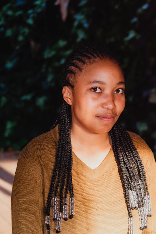 A Portrait of a Girl with Braided Hair