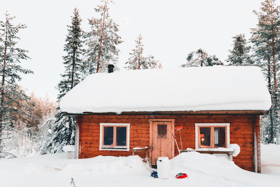 Photo of House Covered With Snow