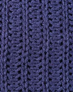 Detailed view of a blue knitted wool fabric with intricate weave pattern.