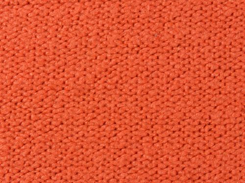 Free Detailed close-up of vibrant orange knitted fabric showcasing intricate texture and weaving. Stock Photo