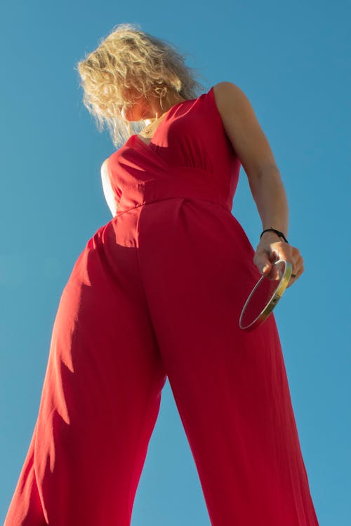 Woman Wearing a Red Jumpsuit