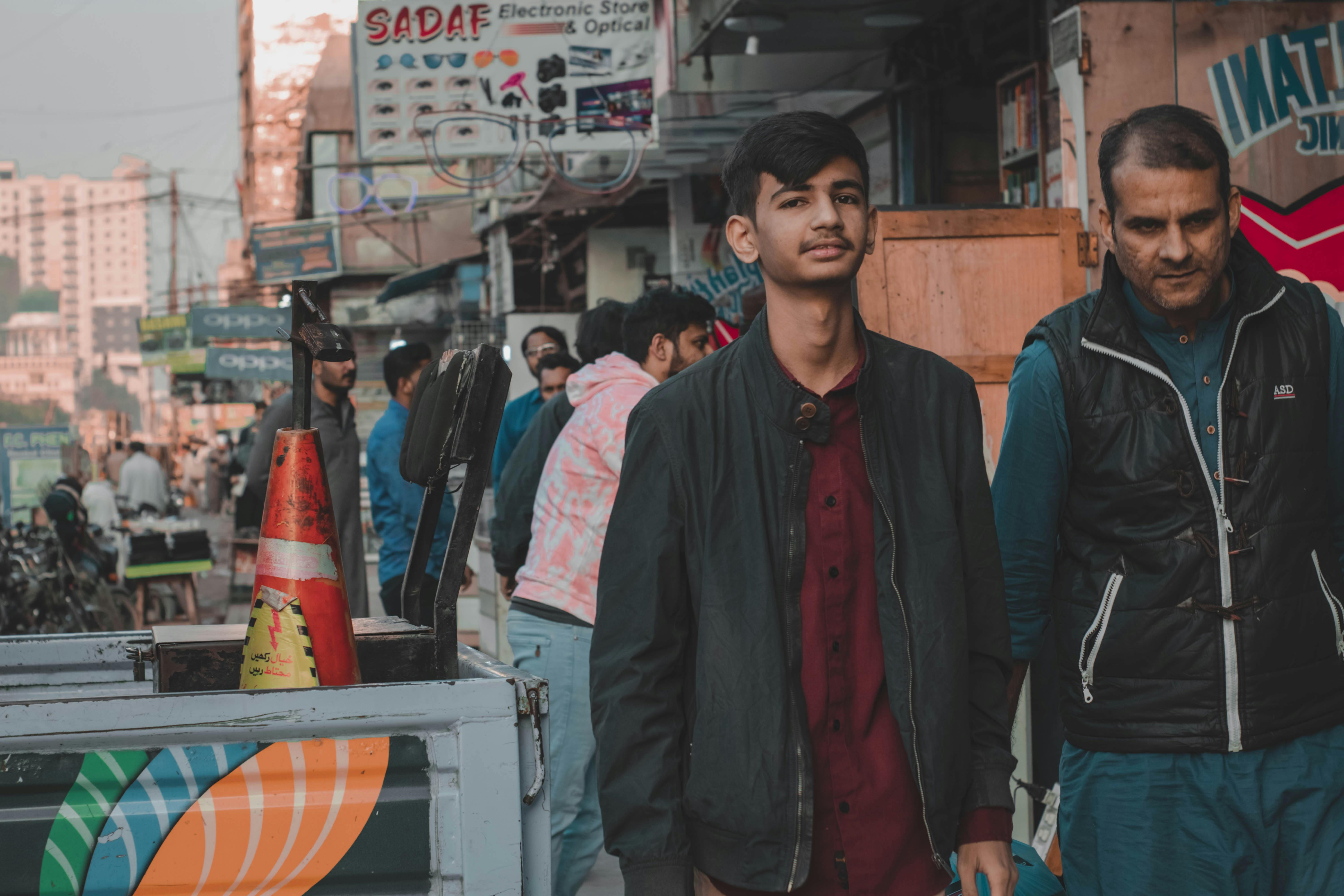 Man Selling on City Street · Free Stock Photo