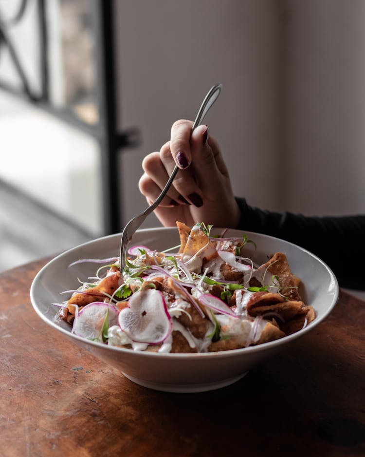 Woman Eating A Salad 