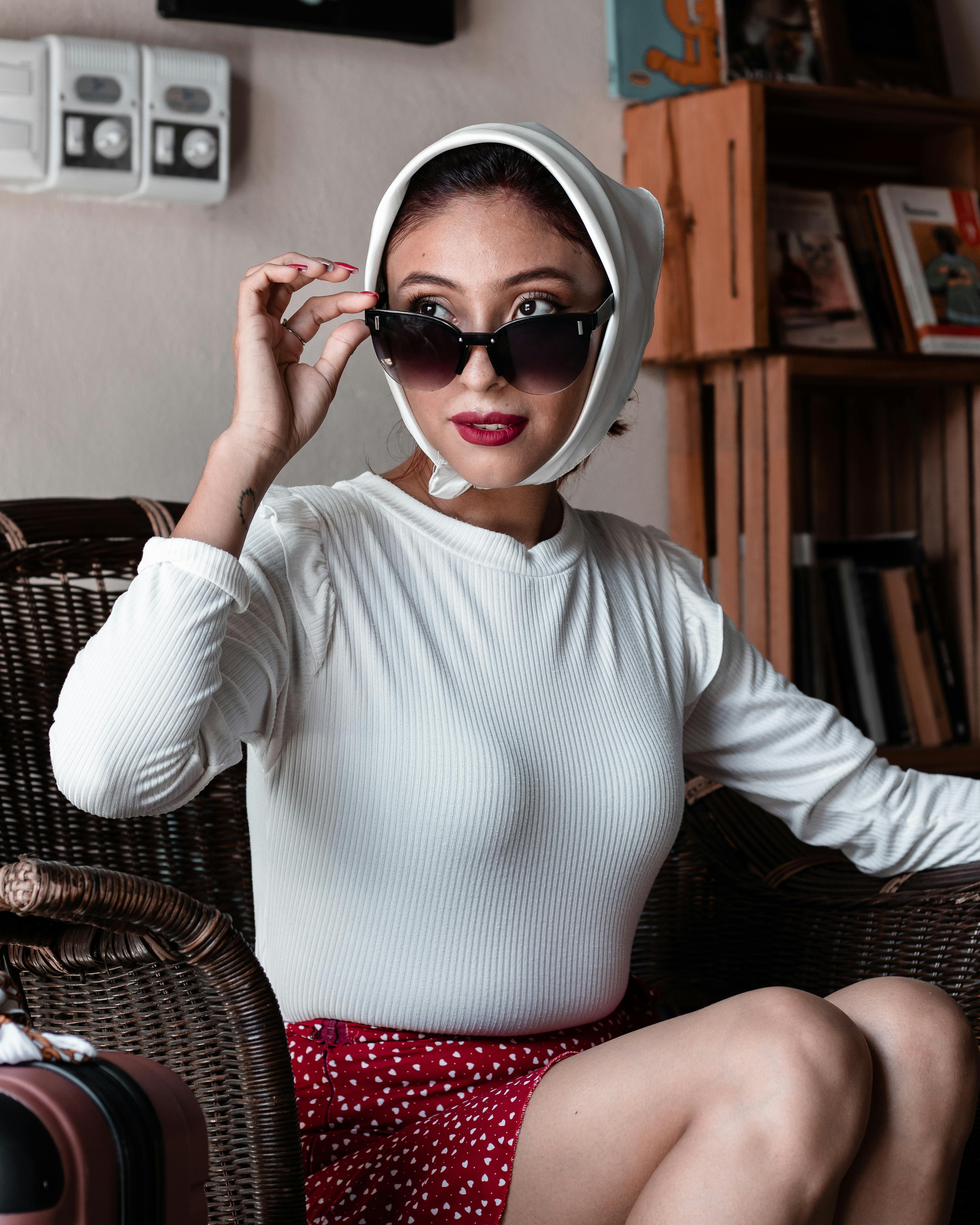 A Woman Wearing Sunglasses Indoors · Free Stock Photo
