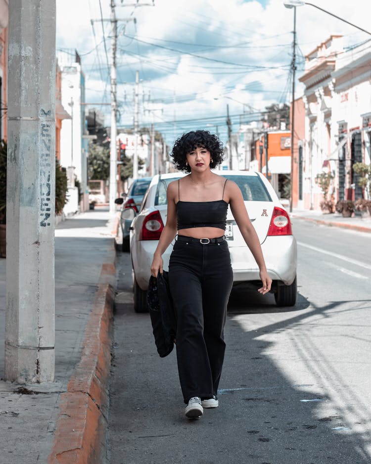 Woman Walking On A Street