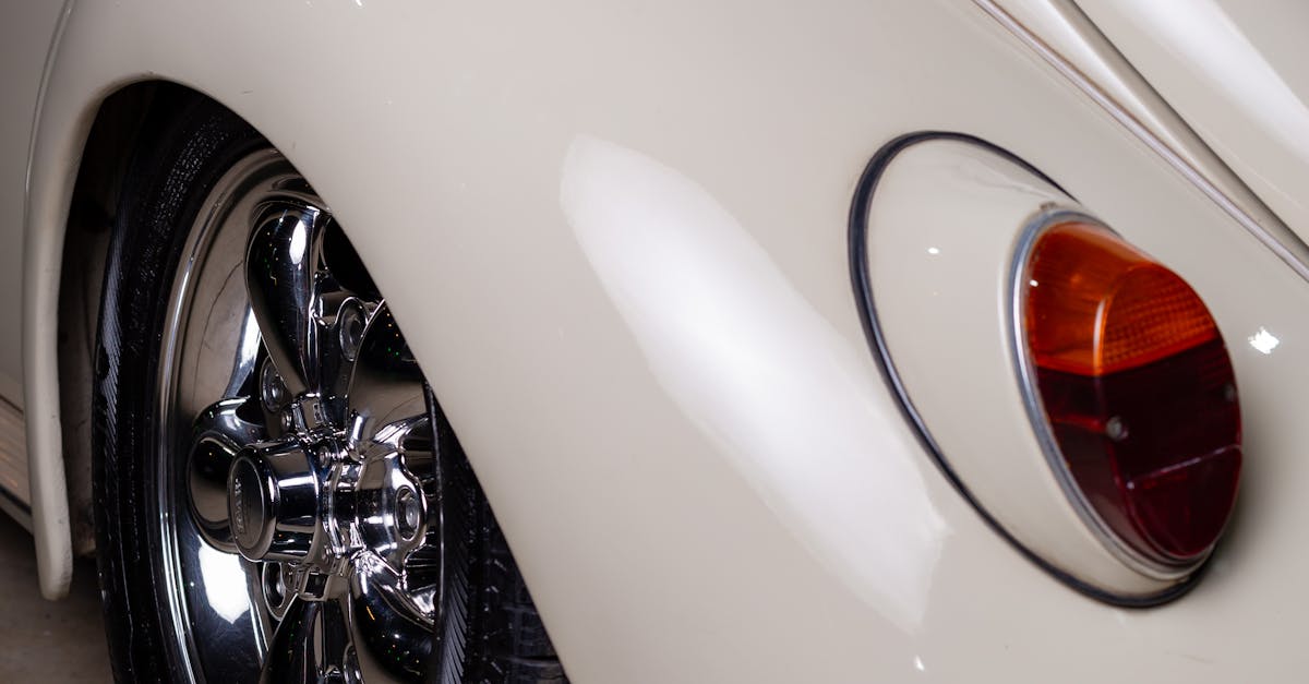 Close Up Photo of White Classic Car with Chrome Rim · Free Stock Photo