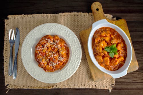 Top View of Curry in Baking Dish and on Plate