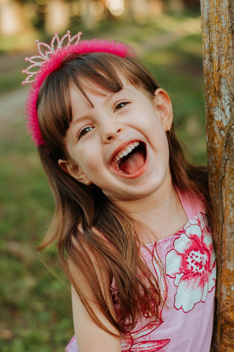 Portrait Of Laughing Kid