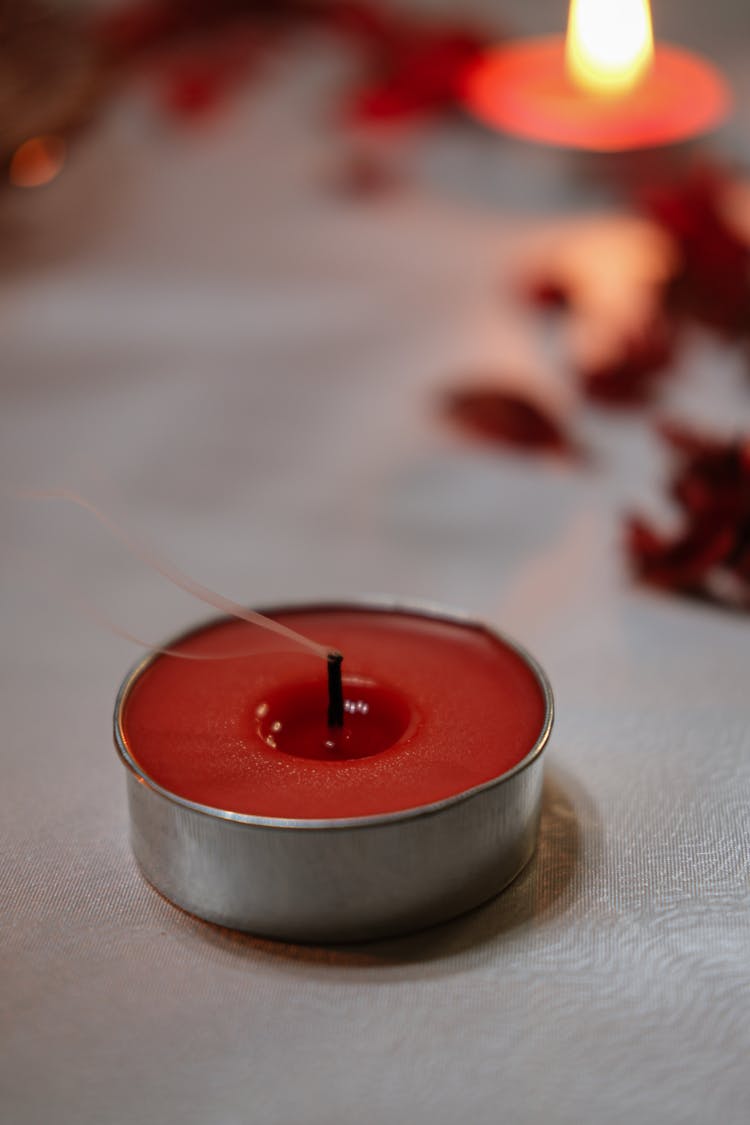 A Red Candle With Holder