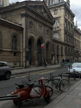 Elegant architecture and bicycles on a quiet street in Paris, France.