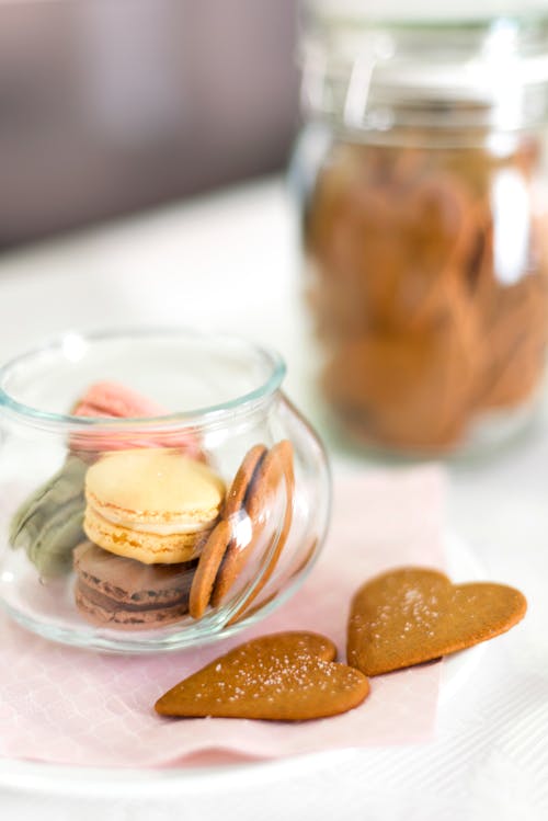 Pastel Macaroons and Heart Shape Gingerbreads in Jars