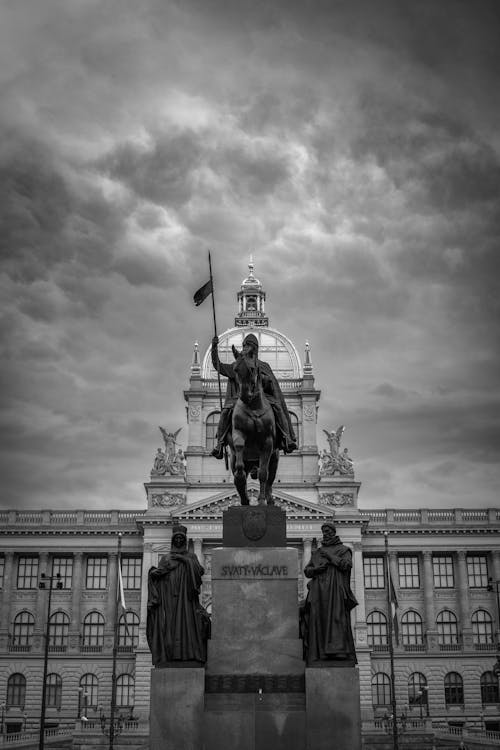 Clouds over Monument near Palace in Black and White