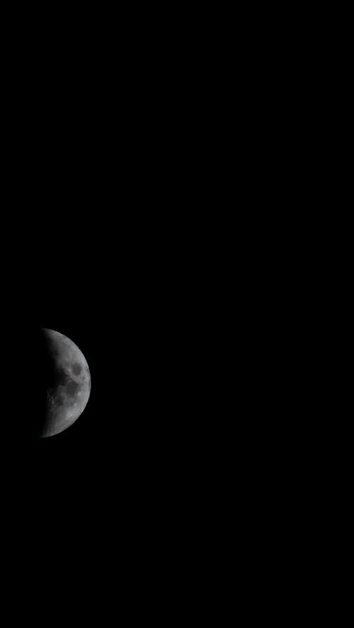 Dark Photo of a Crescent Moon