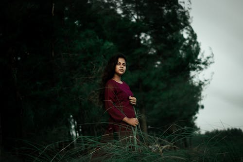 Woman Posing near Trees