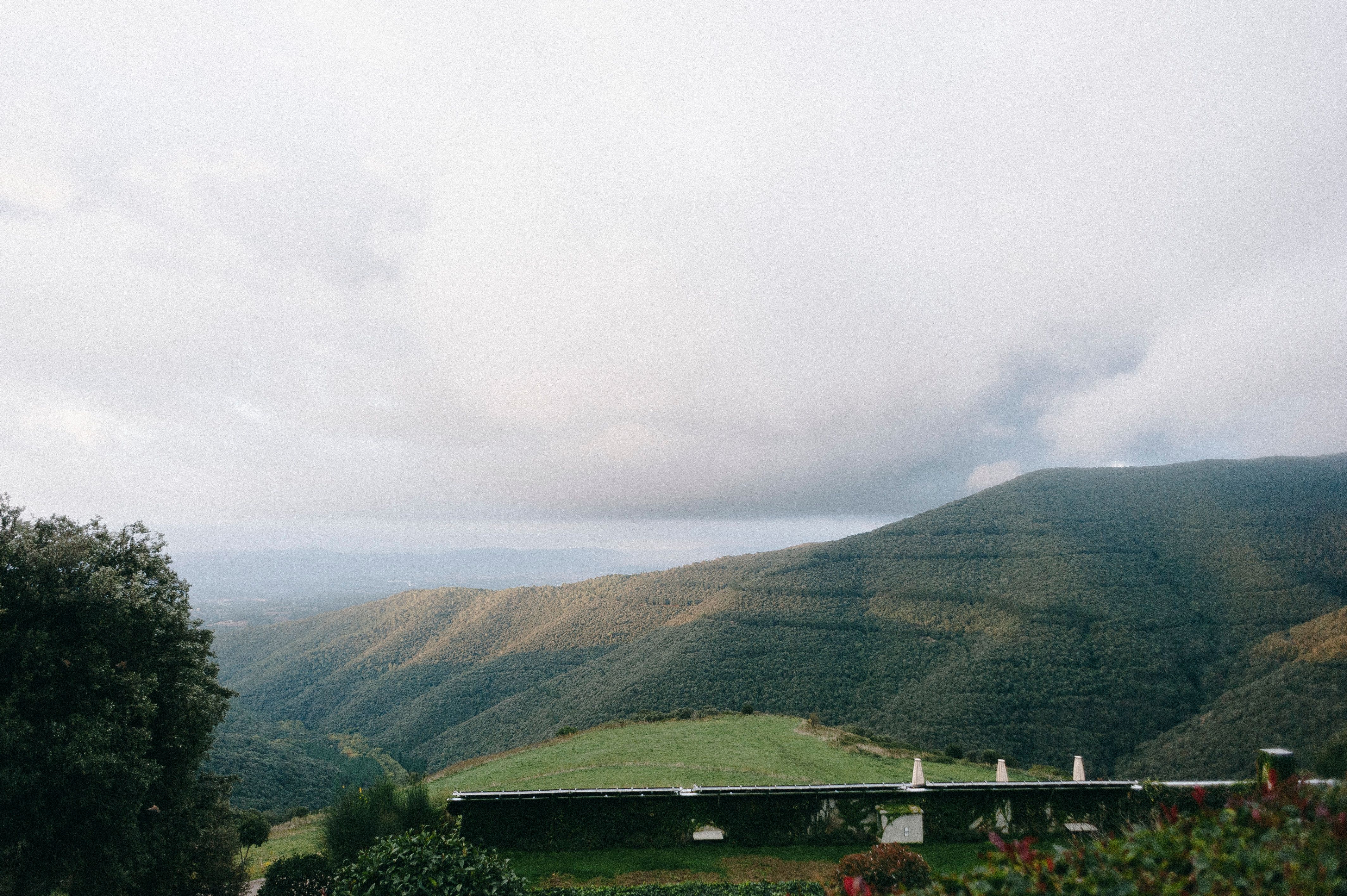 Green Mountain Under Cloudy Sky · Free Stock Photo