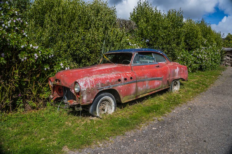 Abandoned Retro Car On Side On Road