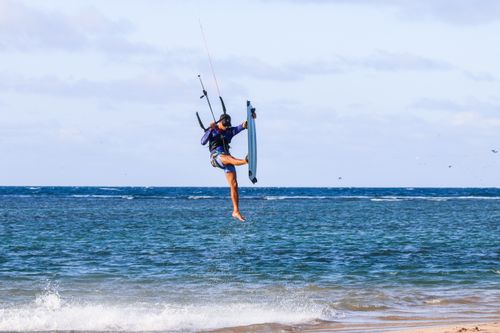 Free Exciting kitesurfing action on the coast of Adicora, Venezuela, capturing the thrill of adventure sports. Stock Photo