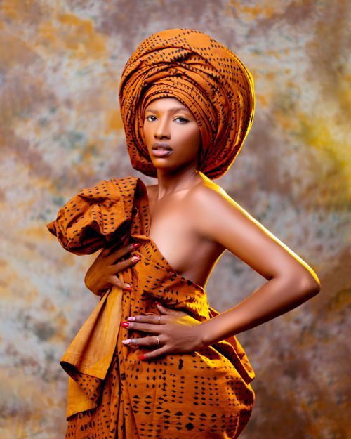 Free Striking portrait of a woman in traditional African attire in Abidjan, showcasing cultural elegance. Stock Photo