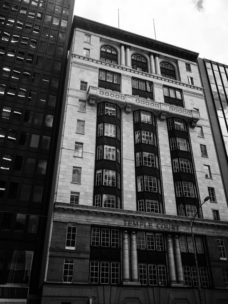 Grayscale Photo Of Concrete Building