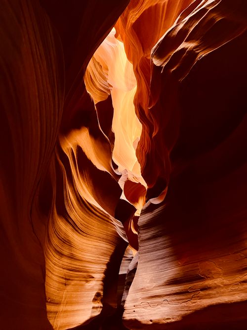 Free Sunlit sandstone walls creating mesmerizing patterns in Antelope Canyon. Stock Photo