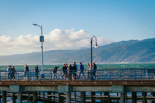 People Walking on the Santa Monica Pier in California, USA 