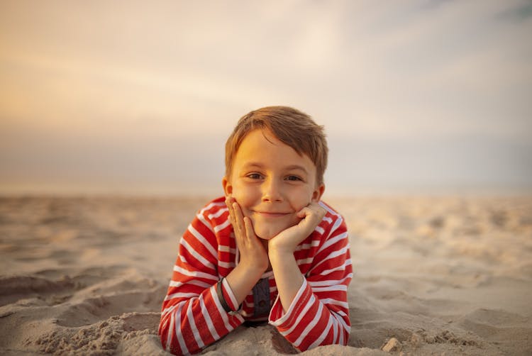 Smiling Boy Lying Down