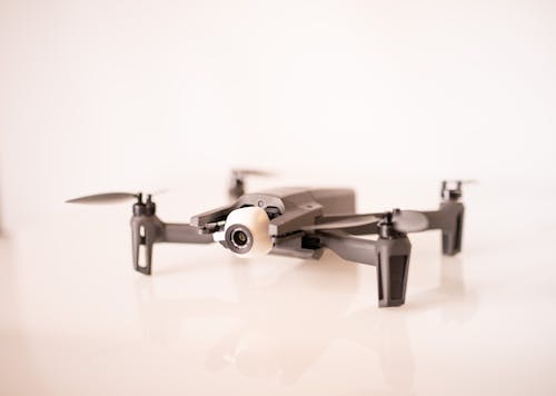 Foto d'estoc gratuïta de càmera drone, dron, fons blanc