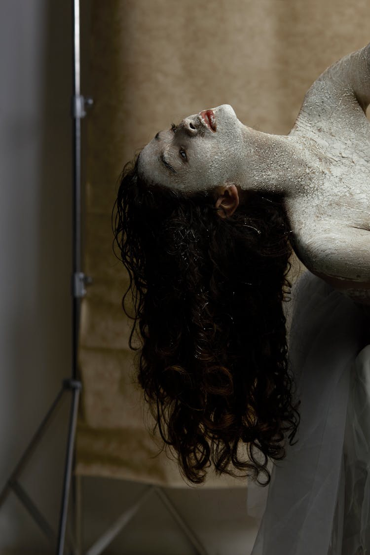 Woman Posing With Paint On Face