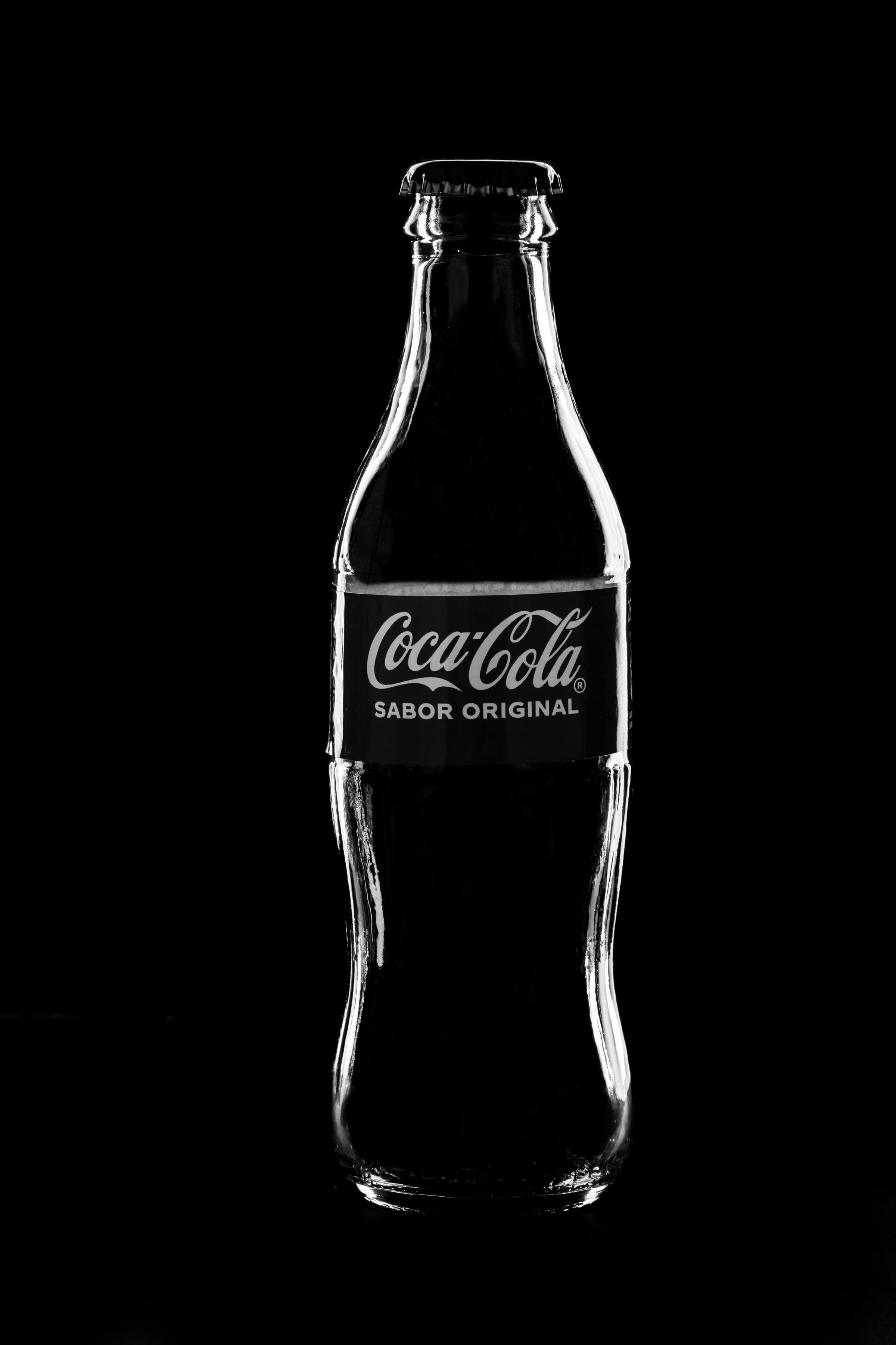 coca cola bottle logo black and white
