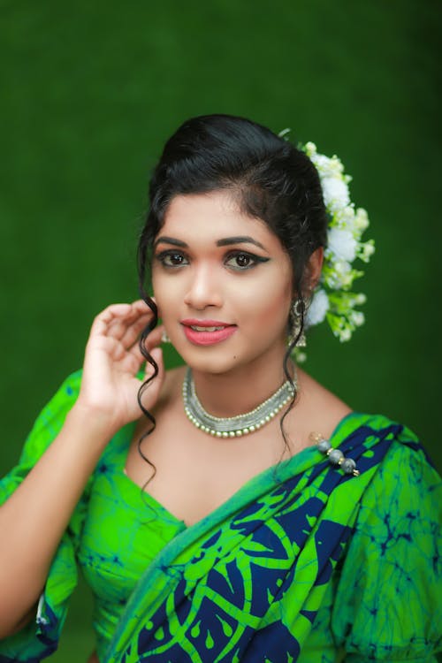 Young Woman in a Green Traditional Dress