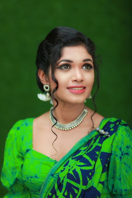 Young Woman in a Green Traditional Dress