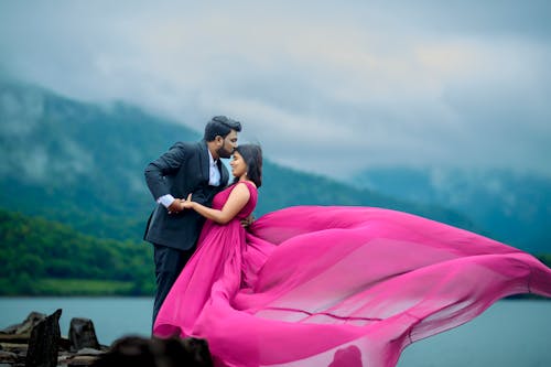 Bride in Pink Dress with Groom in Suit