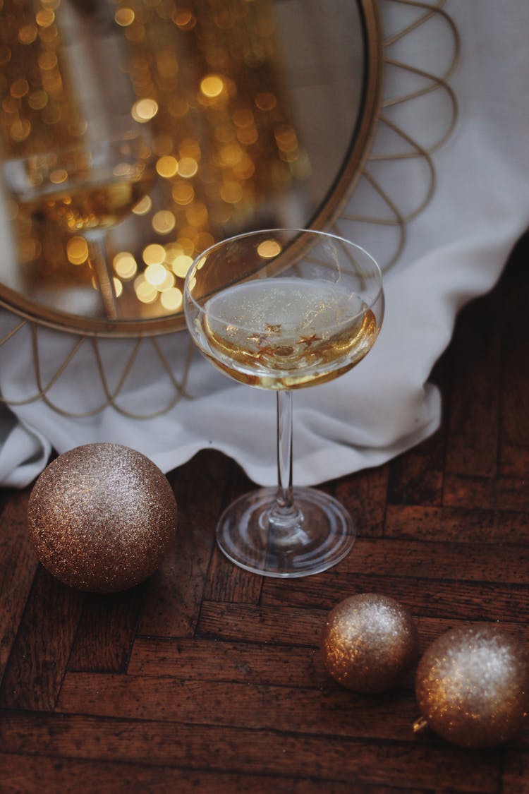 Christmas Balls And Glass Of Alcohol