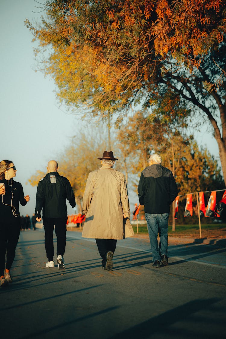 People Walking On Road