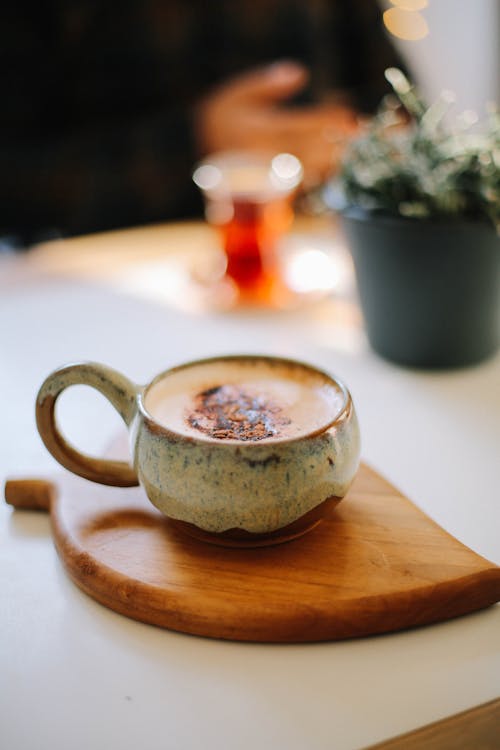 Coffee in a Mug on a Cutting Board 