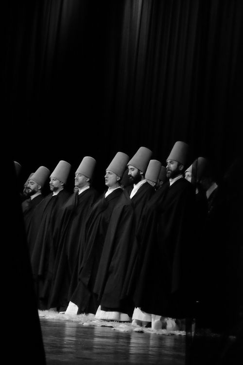Free Captivating black and white photo of Sufi whirling dancers in İstanbul, Türkiye. Stock Photo