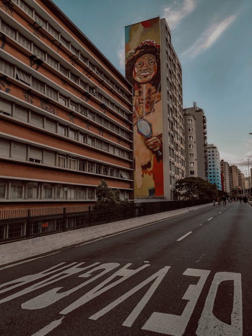 A Mural on the Side of a Block of Flats in City 