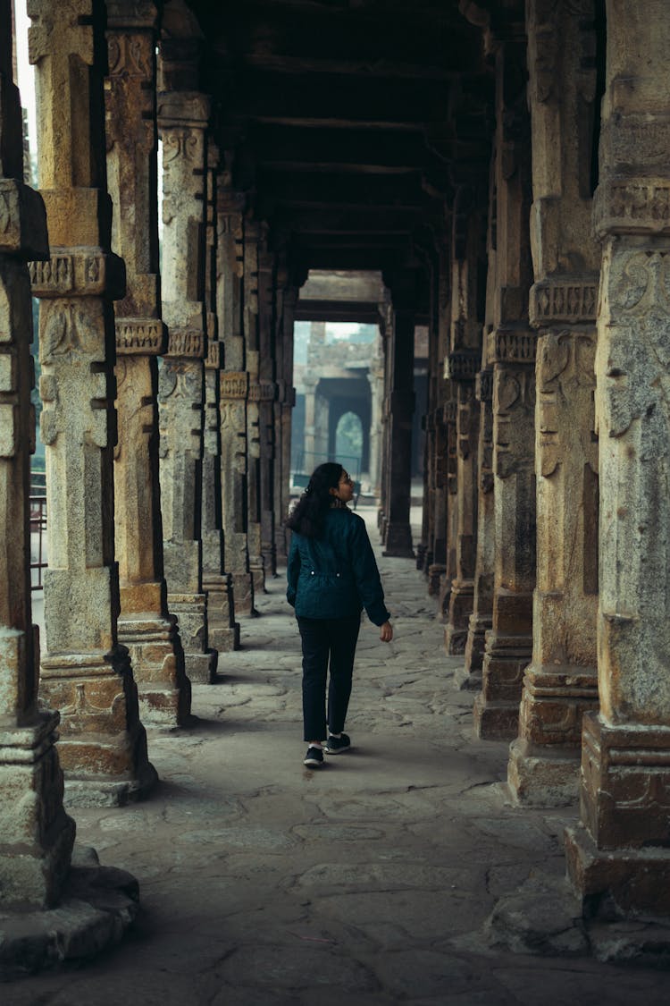 Woman Sightseeing The Qutb Minar, Delhi, India