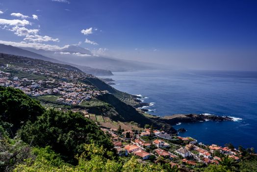 Breathtaking aerial view of El Sauzal coastline with scenic hills and clear skies in Tenerife.
