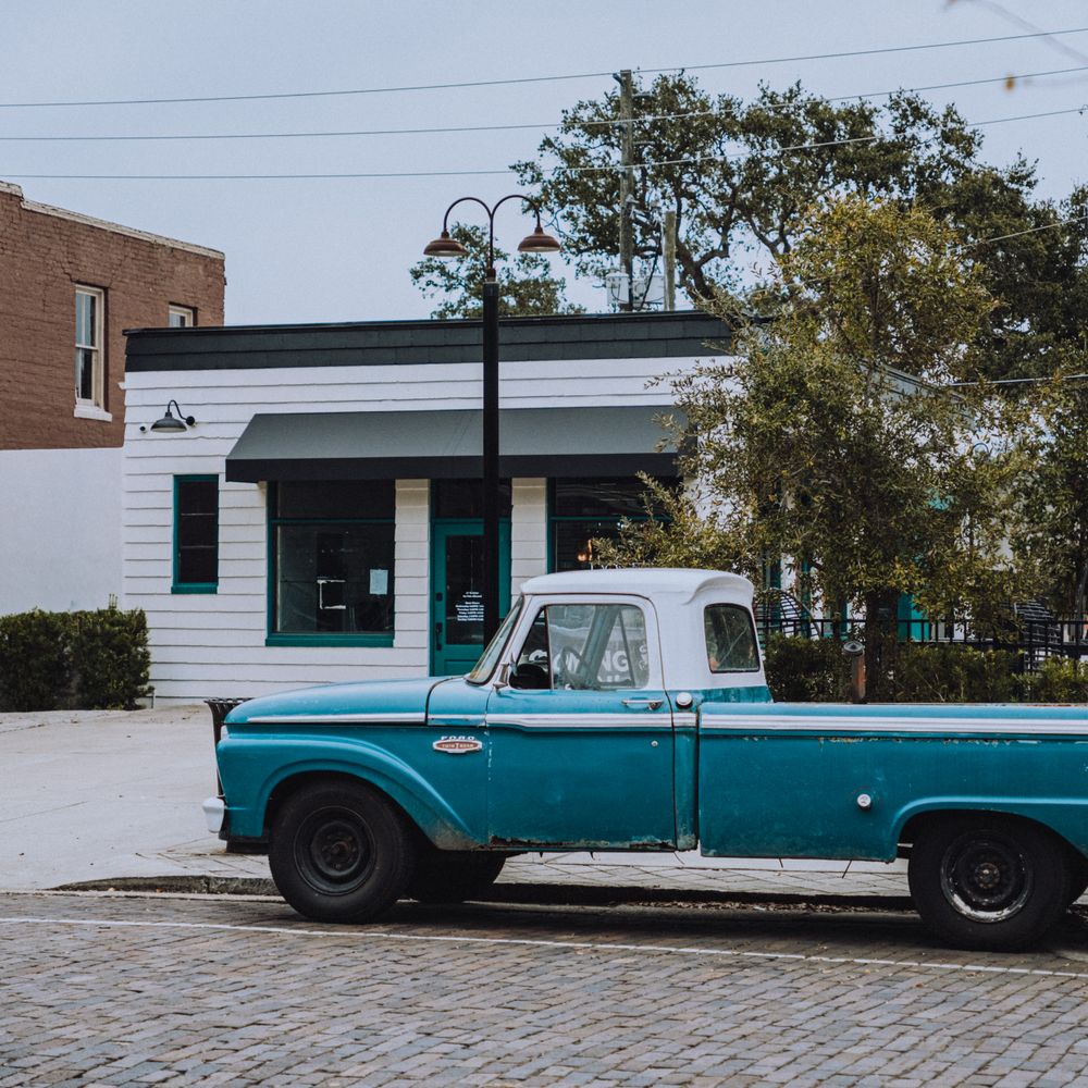 Kingsbridge — movers delivering furniture from a van