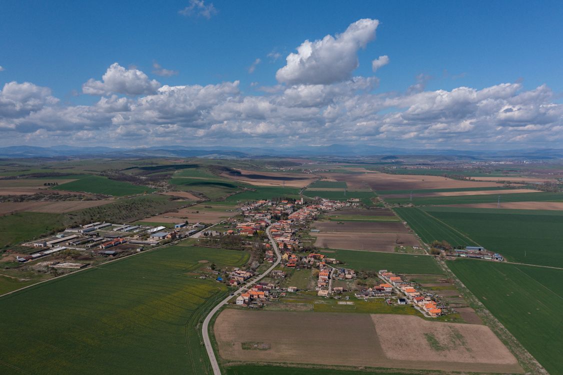 Free Scenic aerial view of Chanava village surrounded by fields in Slovakia. Stock Photo
