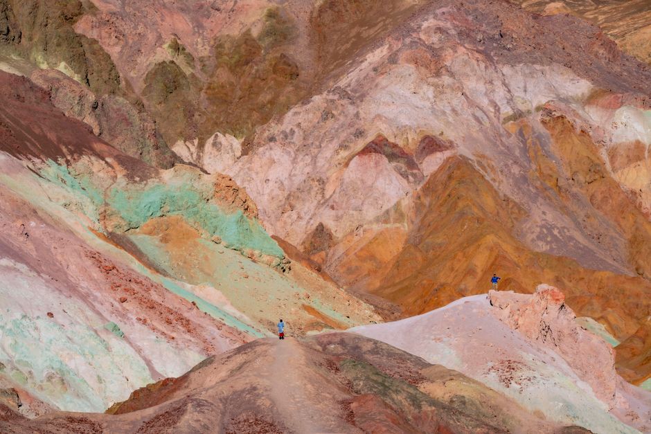 Vibrant geological formations in Death Valley National Park's desert landscape.